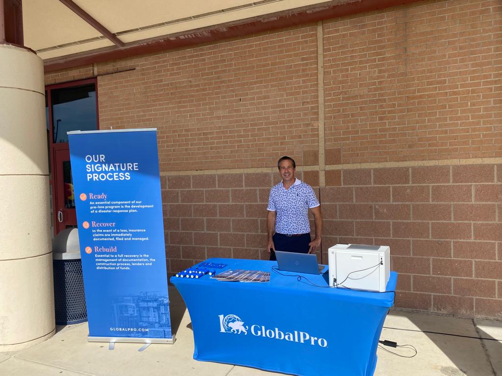 Rob Bowlby, President of GlobalPro Texas at GlobalPro pop up table
